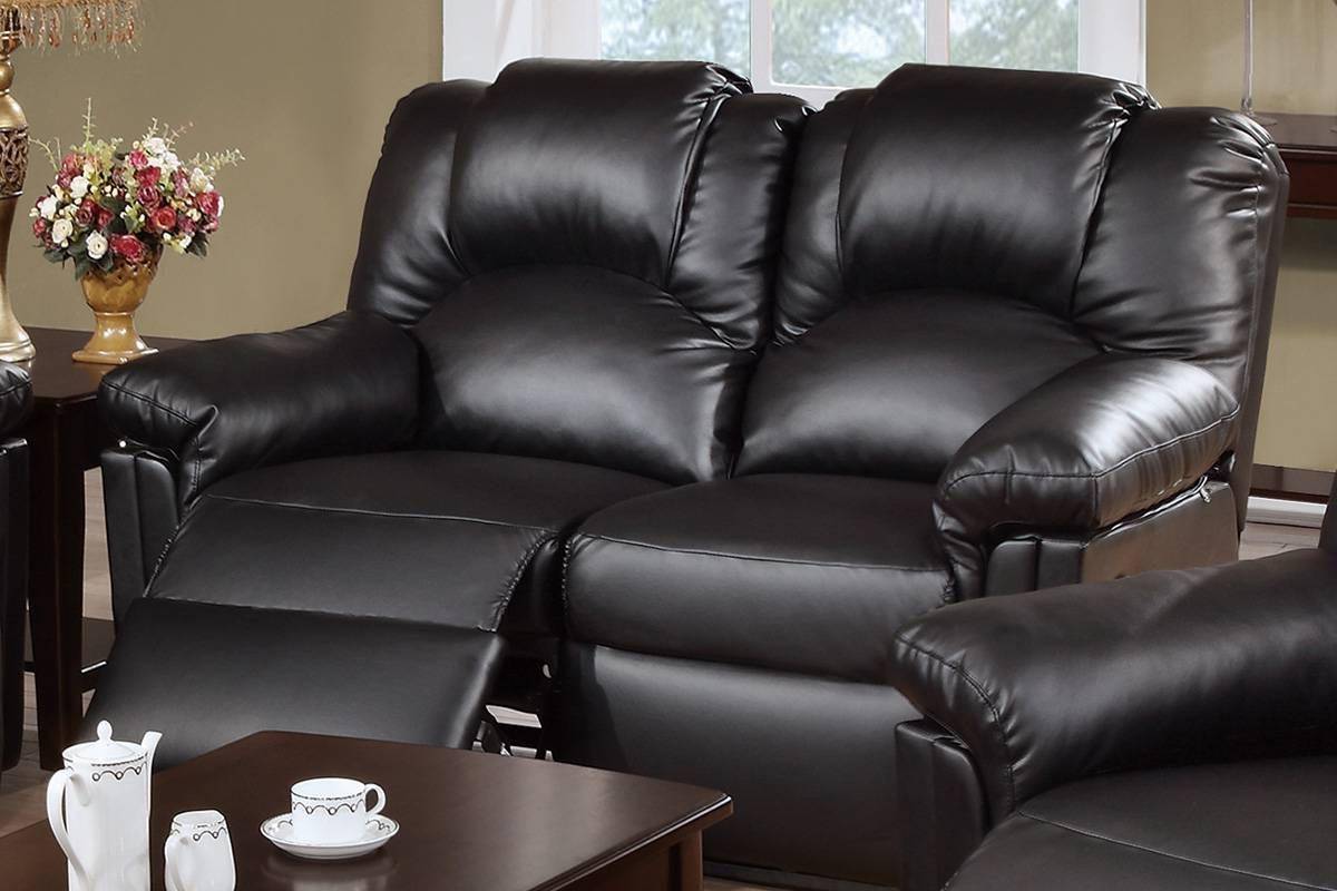black bonded leather motion recliner sofa by poundex