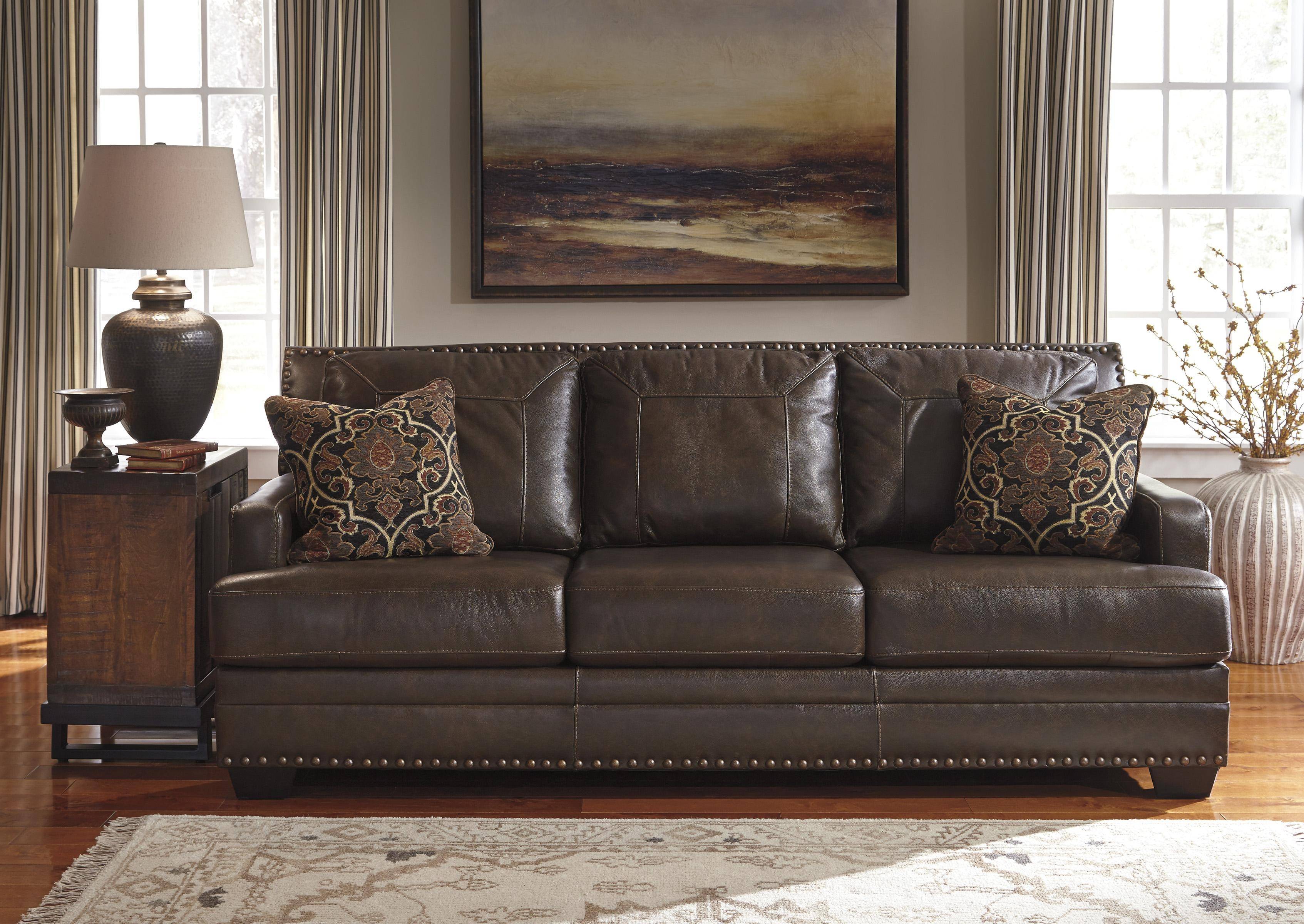 ashley leather brass stud sofa